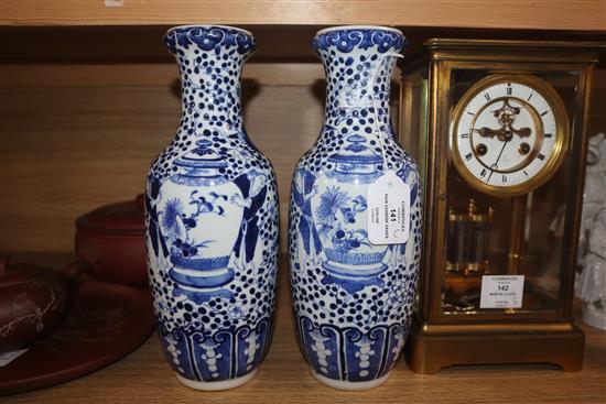 A pair of 19th century Chinese blue and white vases height 30cm